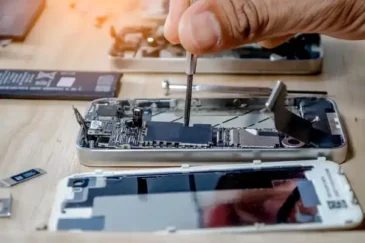 Mobile device repair at Sun City Cell Phone Repair, showcasing cracked screen and battery replacement services.